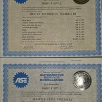 Photograph of ASE certification documents