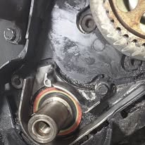 Close-up of exposed engine components during repair work