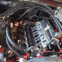 An engine bay during mechanical work